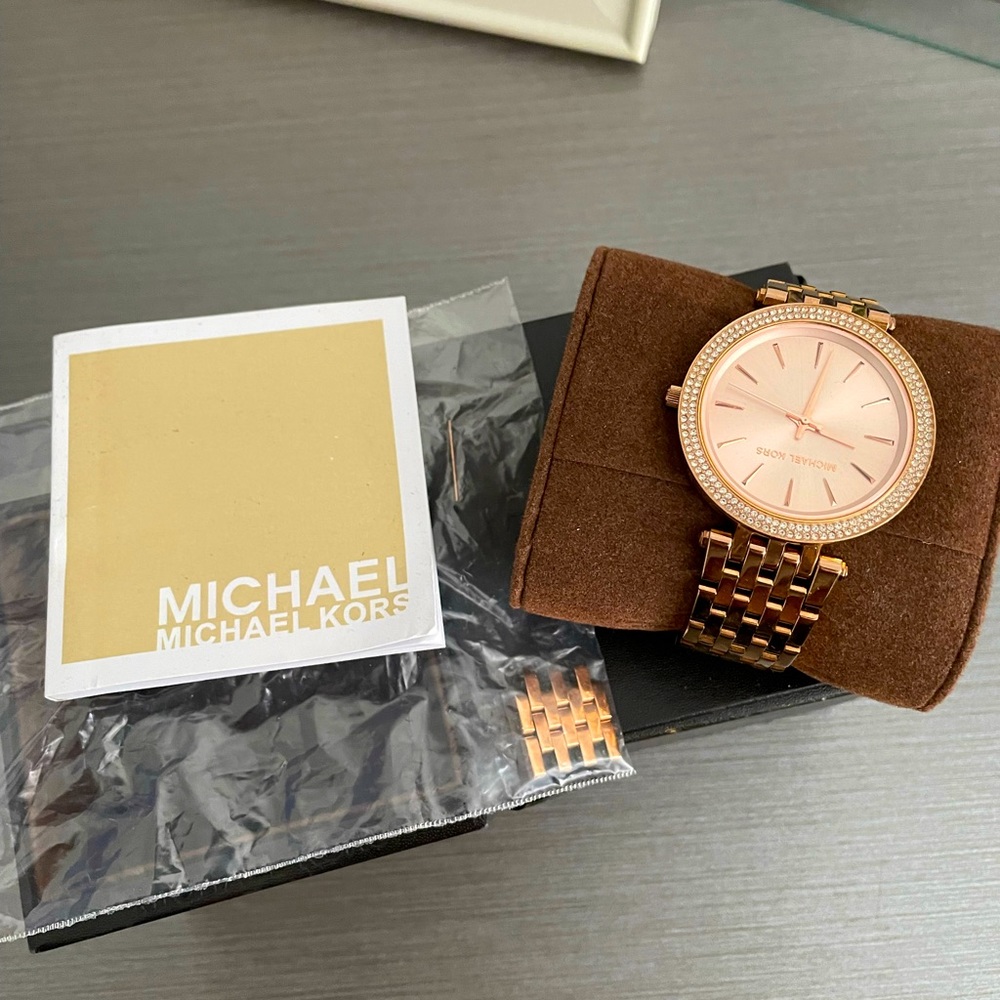 Michael Kors rose gold watch.